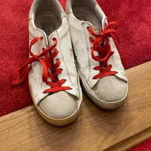 White golden goose superstar with red laces